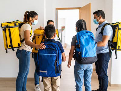 Family practicing wildfire evacuation drill